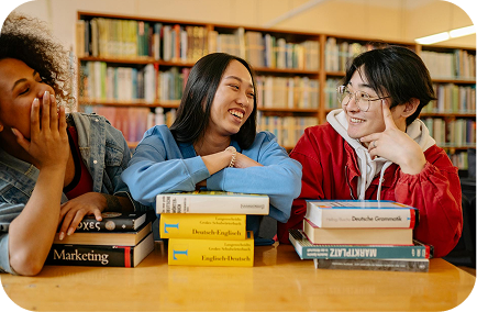 Students studying together in a library