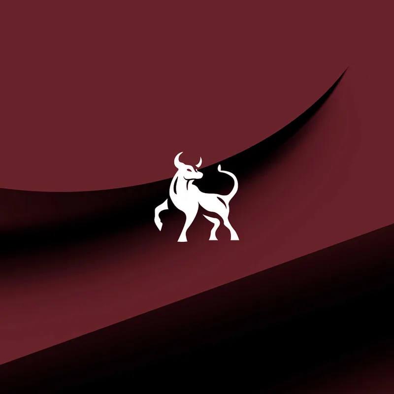 White silhouette of a bull standing with one front leg raised on a maroon and black abstract curved background.