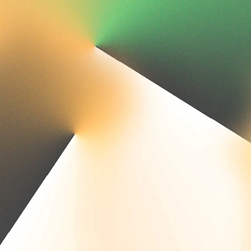 Abstract image with soft gradients featuring a bright white triangular center with smooth transitions to dark green and brown tones at the corners.
