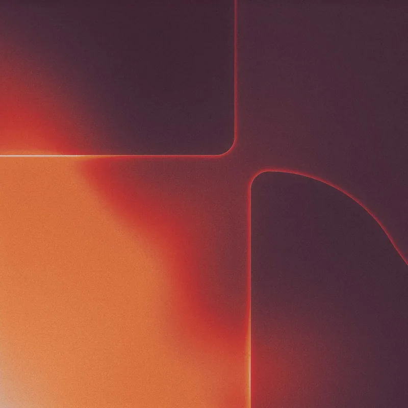 Abstract geometric shapes with a glowing gradient of orange and red on a dark background, featuring rounded corners and a soft, vapor-like effect.