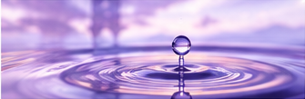 Single droplet and ripple used as a reflective visual metaphor
