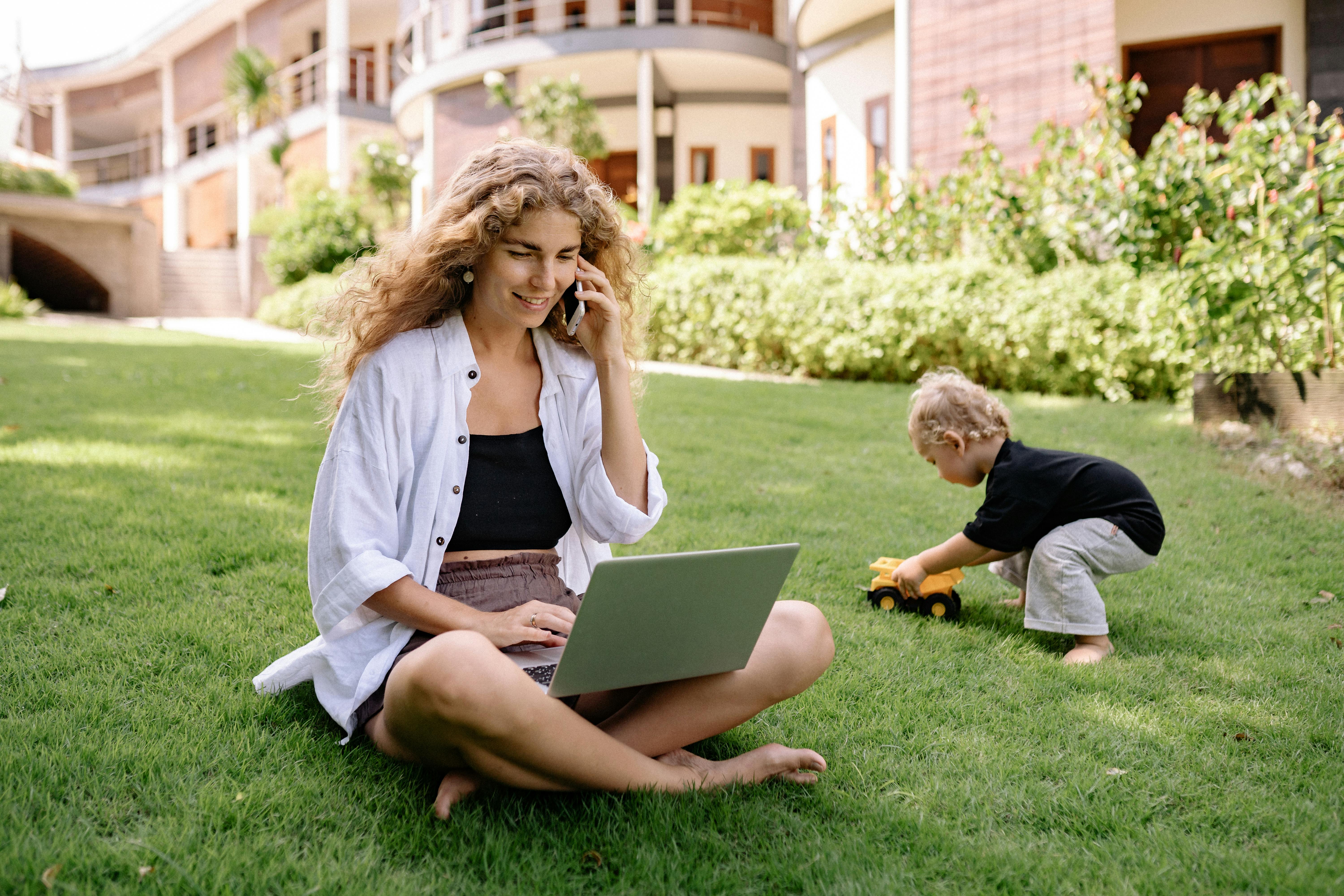 Girl with child outside stock image