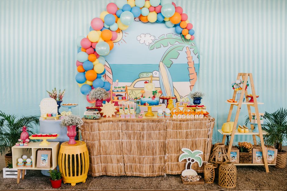 Birthday party table decorated with balloons