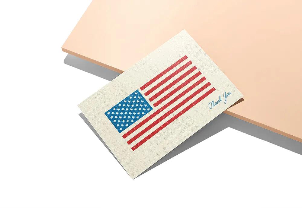 American flag thank you card standing on a cupboard