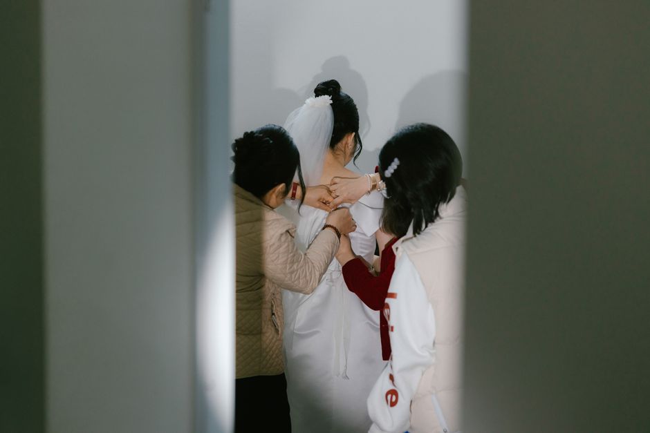 A newly engaged couple embracing