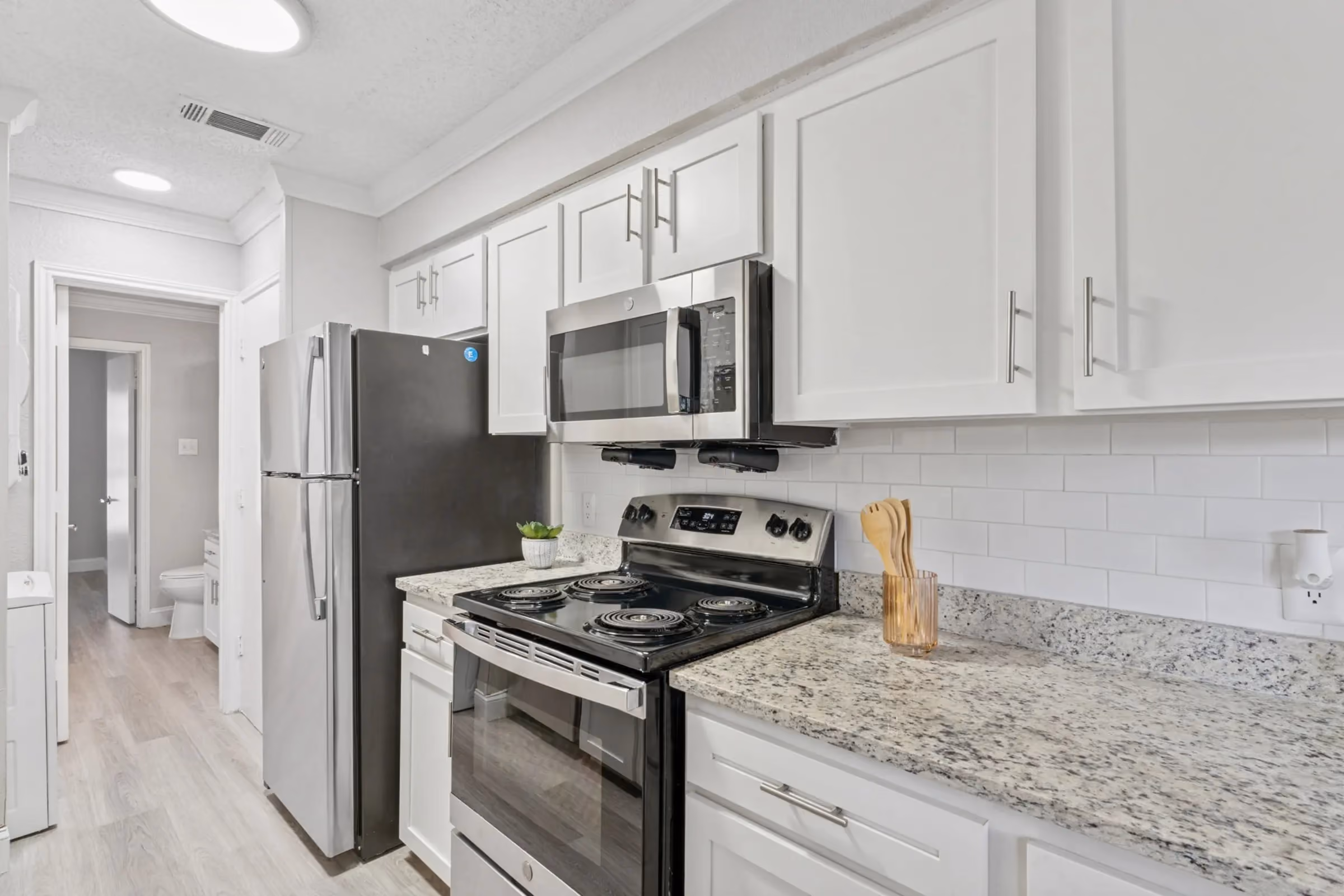 Full kitchen appliance package (range, microwave, dishwasher, refrigerator)