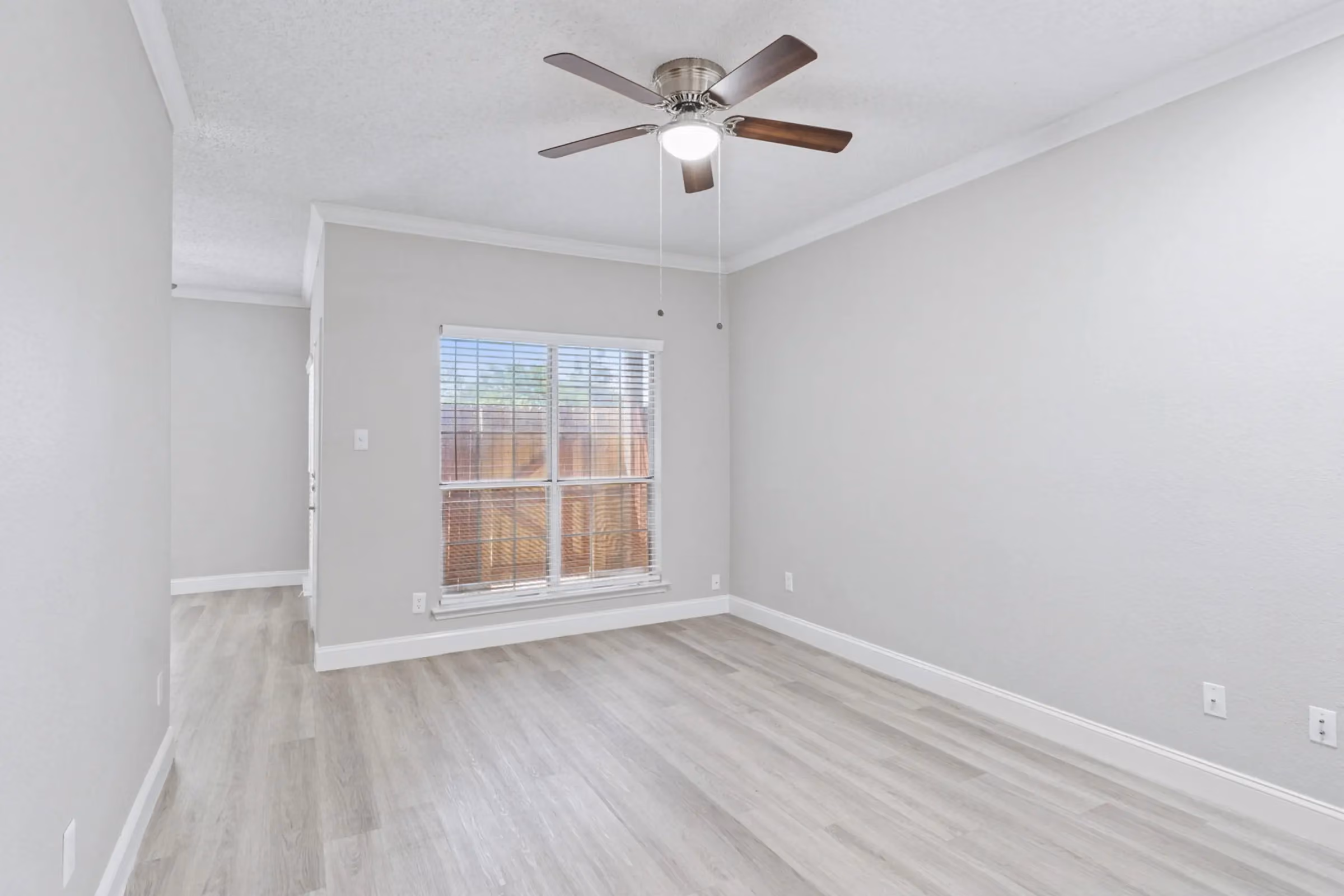 living room and window at Willow Ridge Townhomes and Apartmnets in Euless, Texas