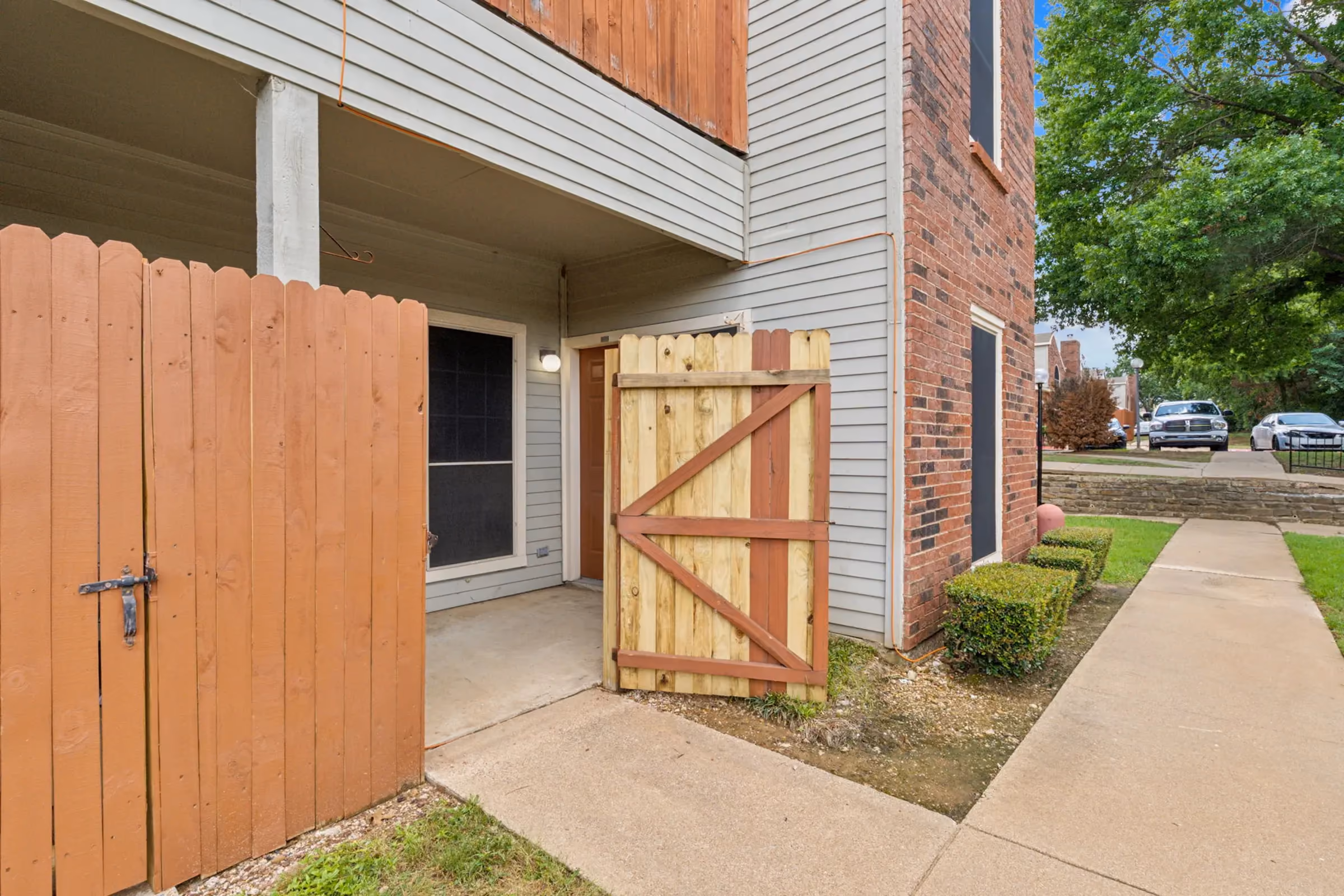 Exterior of patio area at Willow Ridge Townhomes and Apartmnets in Euless, Texas