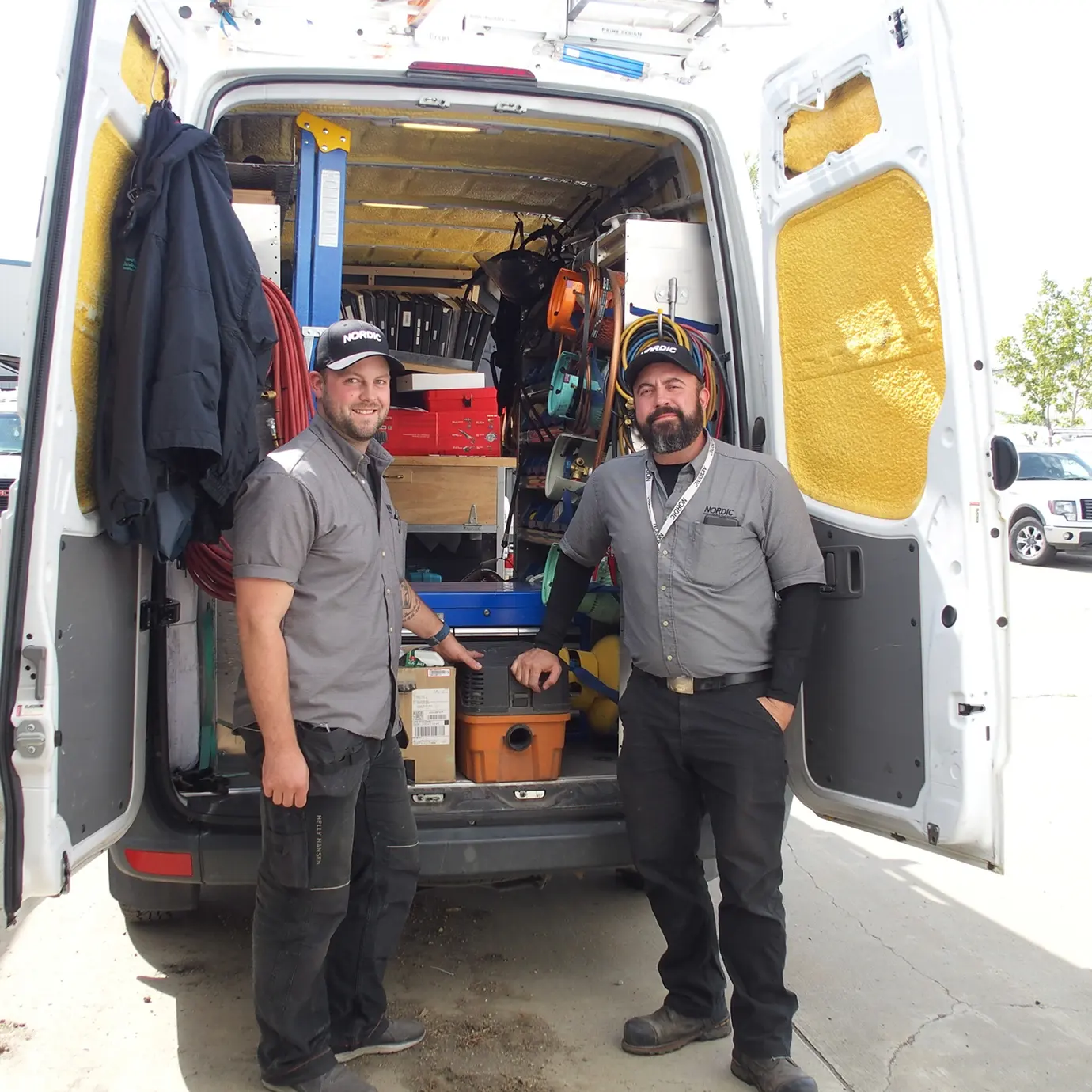 Nordic technicians with a service van