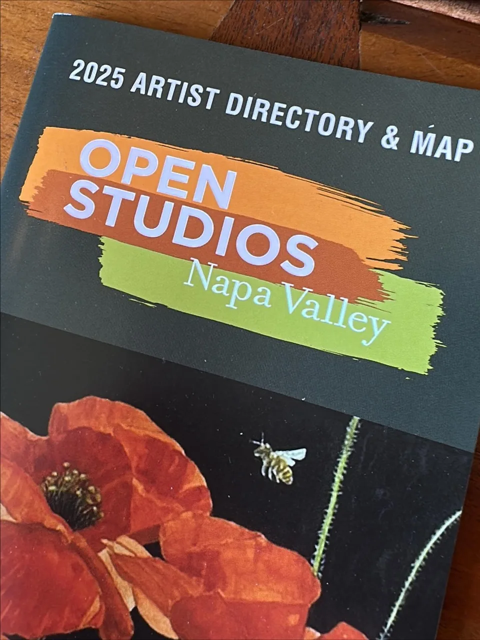 The 2025 Open Studios Napa Valley artist directory and map with a painted poppy on the cover.