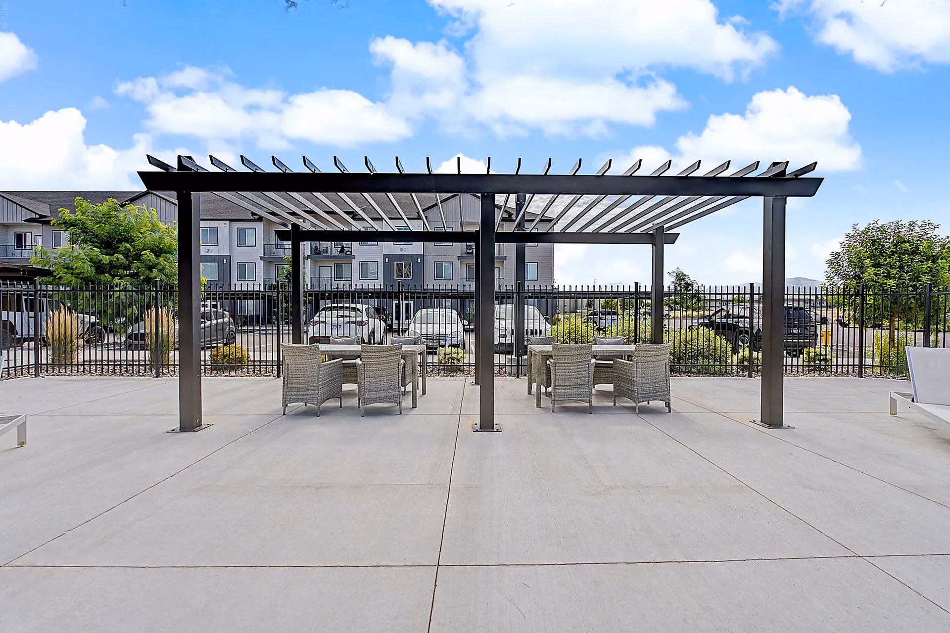 Poolside pergola with tables and chairs