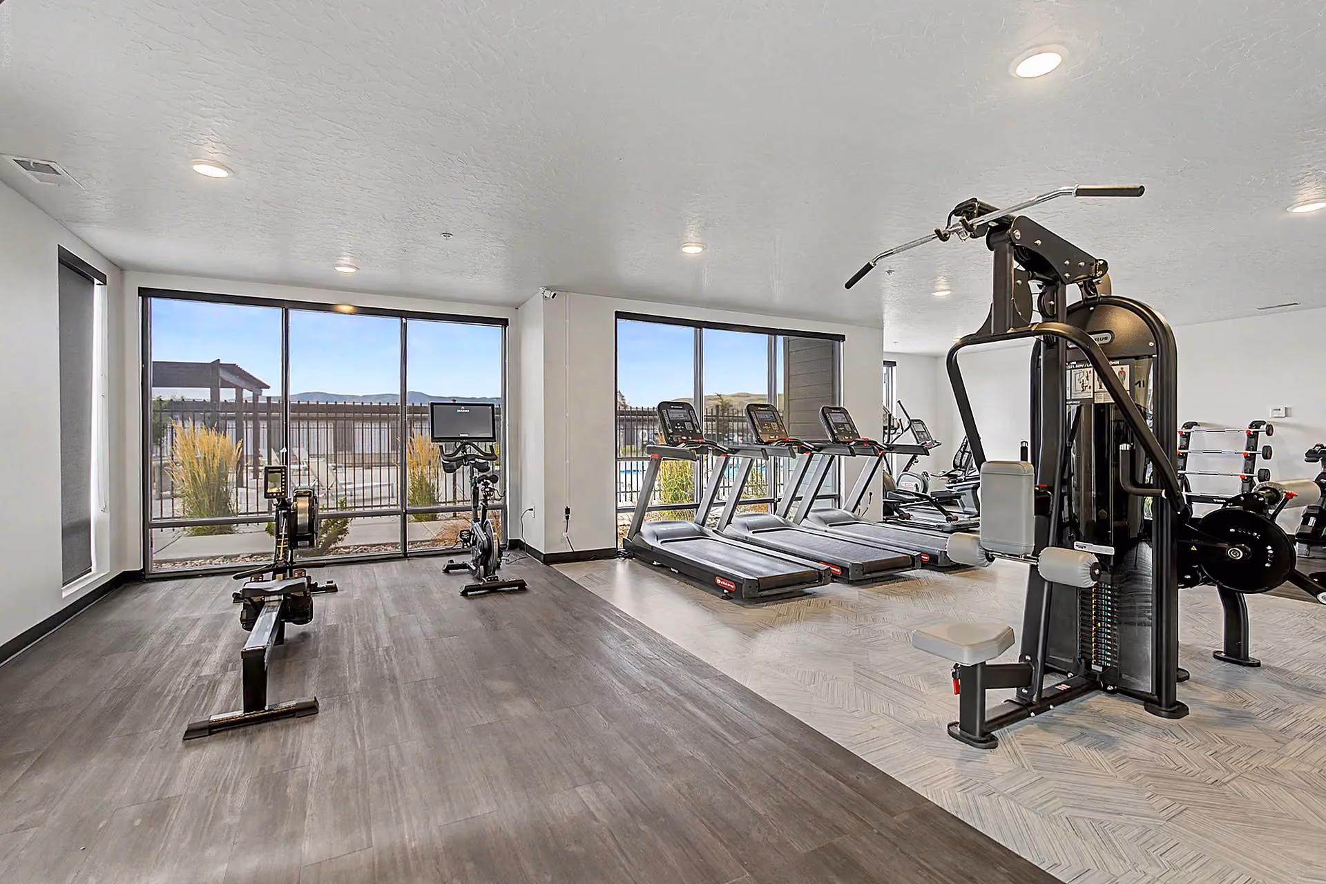 Fitness Center with strength training equipment and cardio machines
