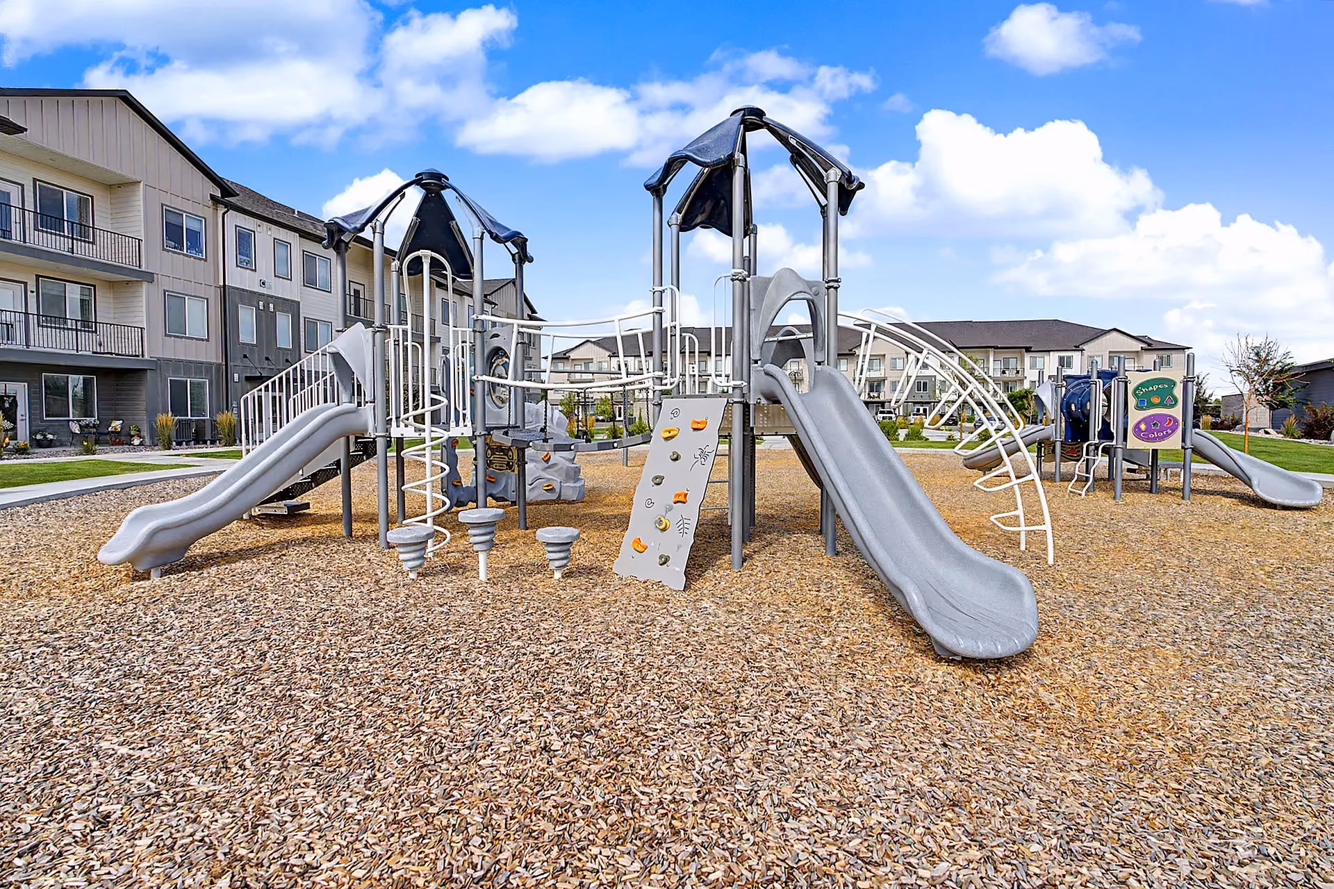 Playground with climbing structures and slides