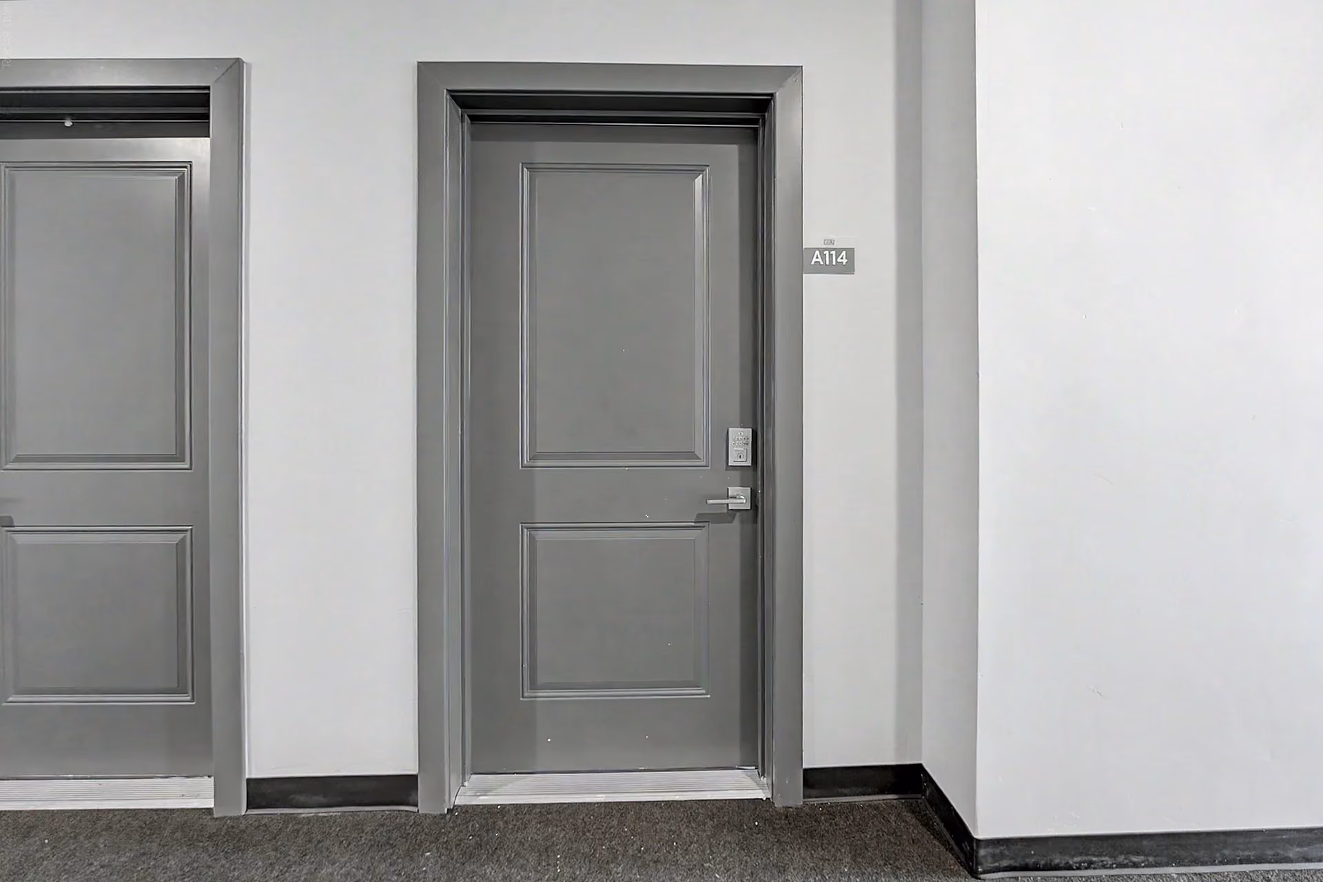 Exterior door of apartment with keypad entry lock