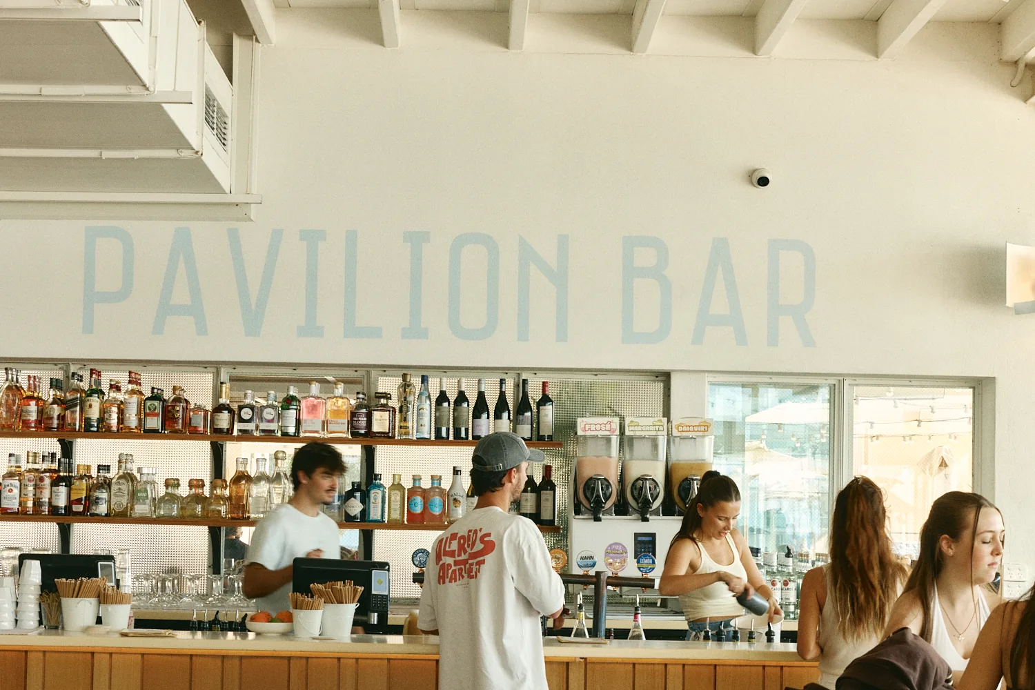 Bartenders serving guests at the Pavilion Bar