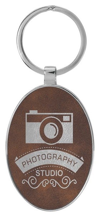 3" x 1 3/4" Leatherette/Metal Rustic/Silver Oval Keychain — catalog reference 832