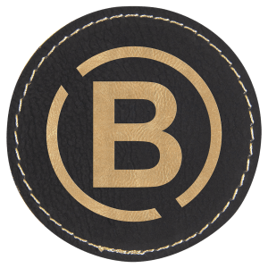 2 1/2" Round Black/Gold Leatherette Patch with Adhesive — catalog reference 1361