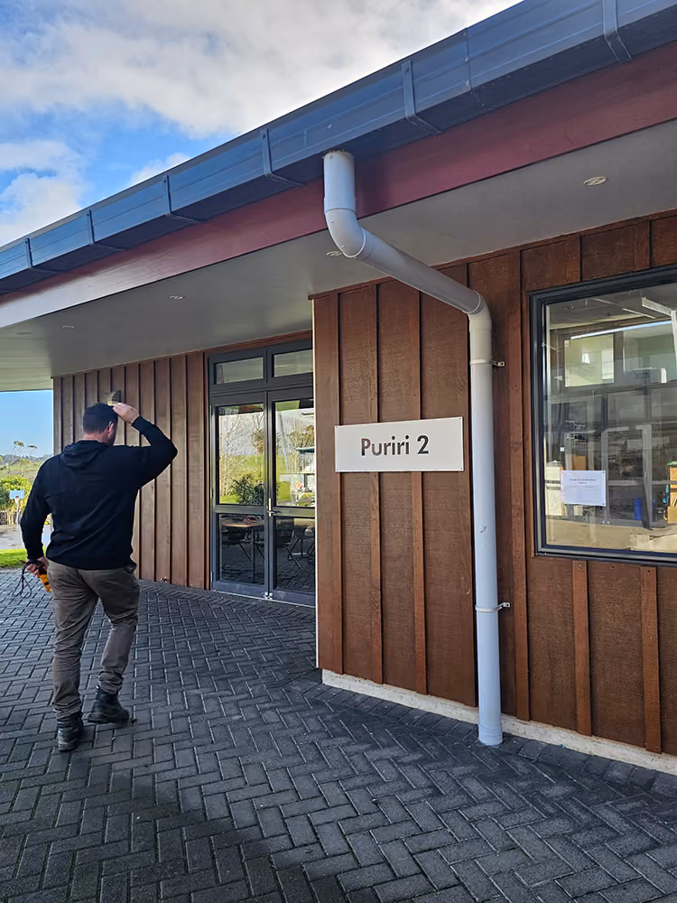 Livewire electrician checking a school classroom block before starting work