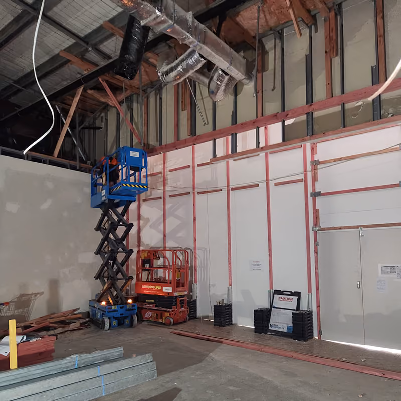 Levi's Westfield Albany fit-out with scissor lift and framing