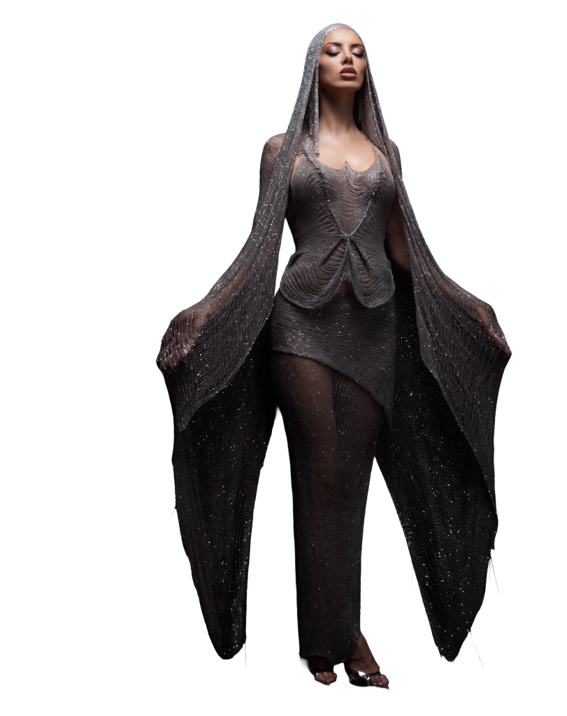 Sara Landry in a crystal-embellished gown and hood