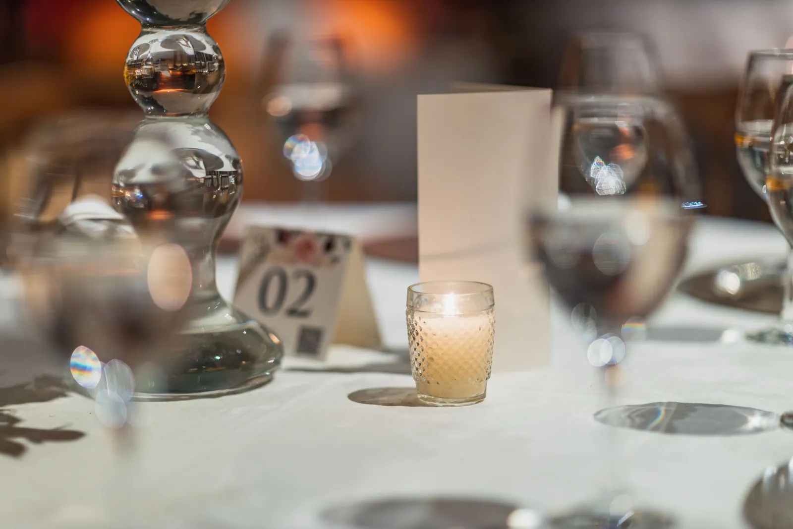 Candlelit table set for dinner