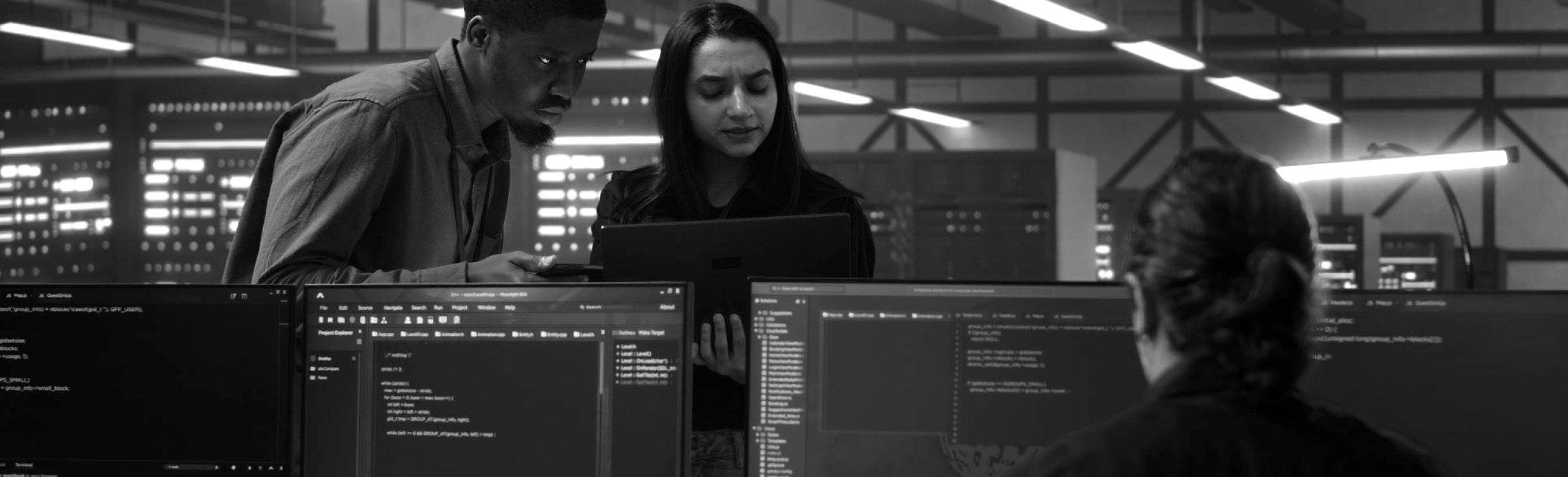ChronoScale engineers reviewing code together in a data center