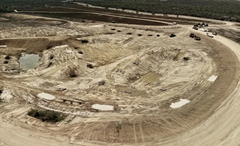Aerial view of a commercial site graded and ready for building