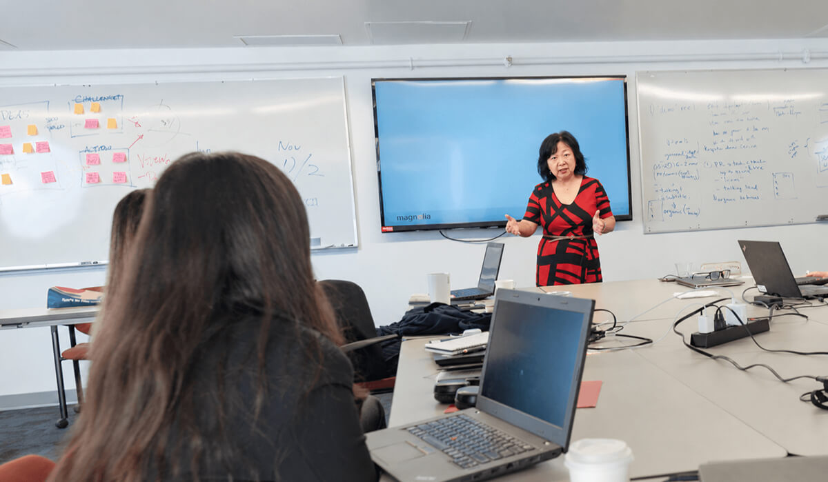Presenter leading a training session in the office