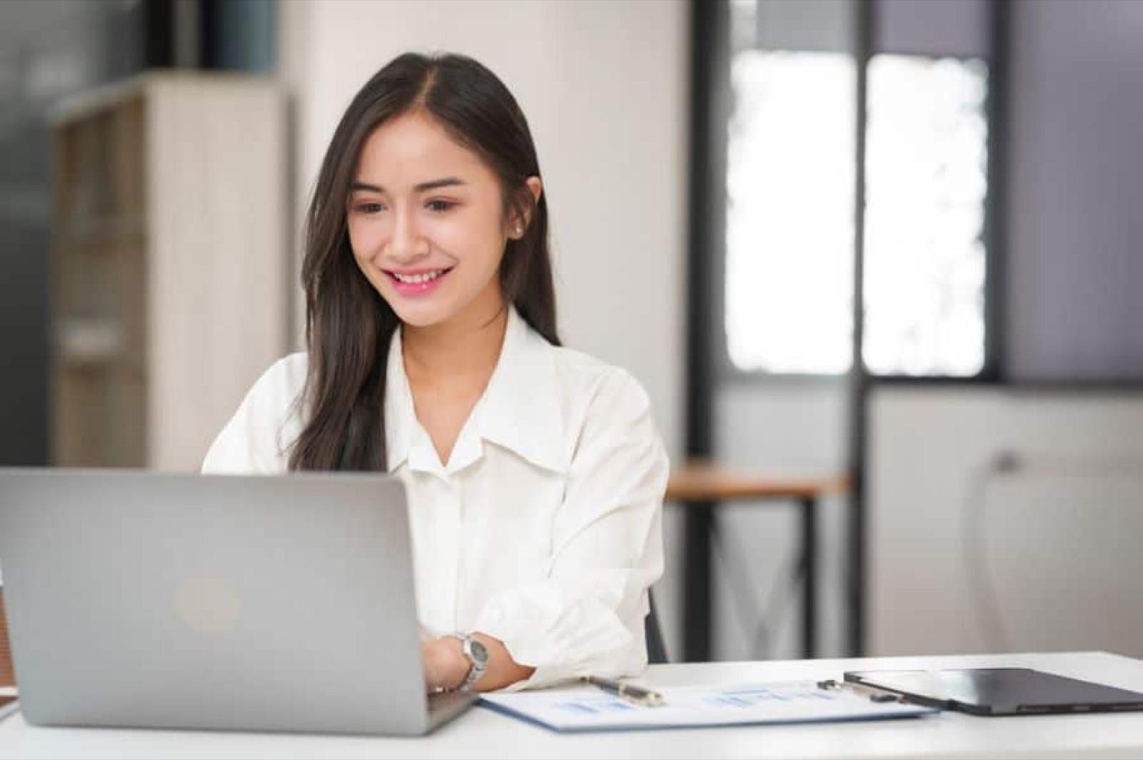 HR professional using a payroll system