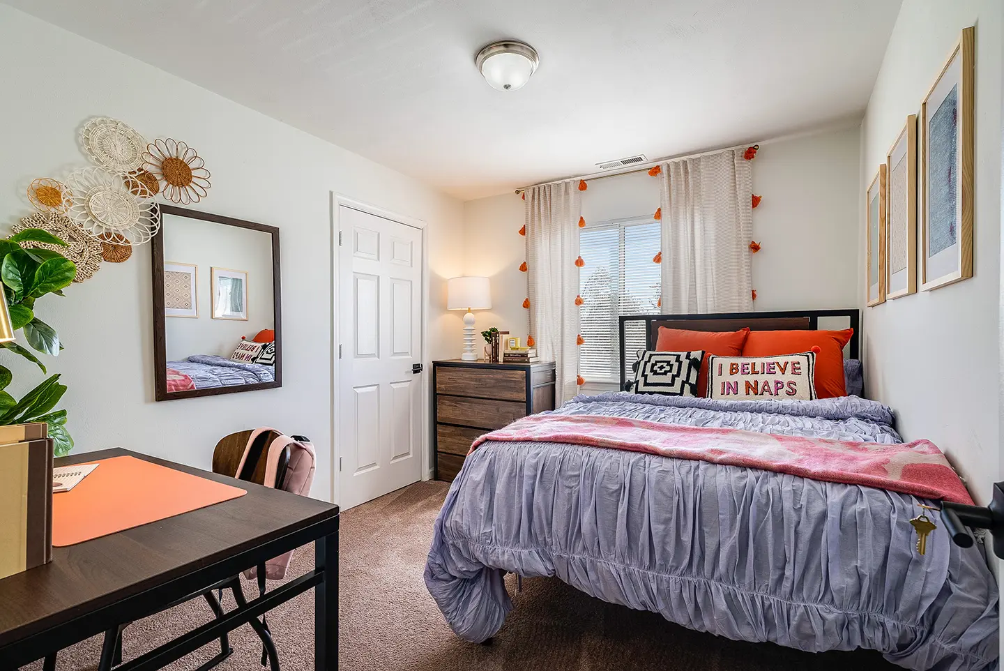 Furnished bedroom with a full-size bed at The Hills Northview