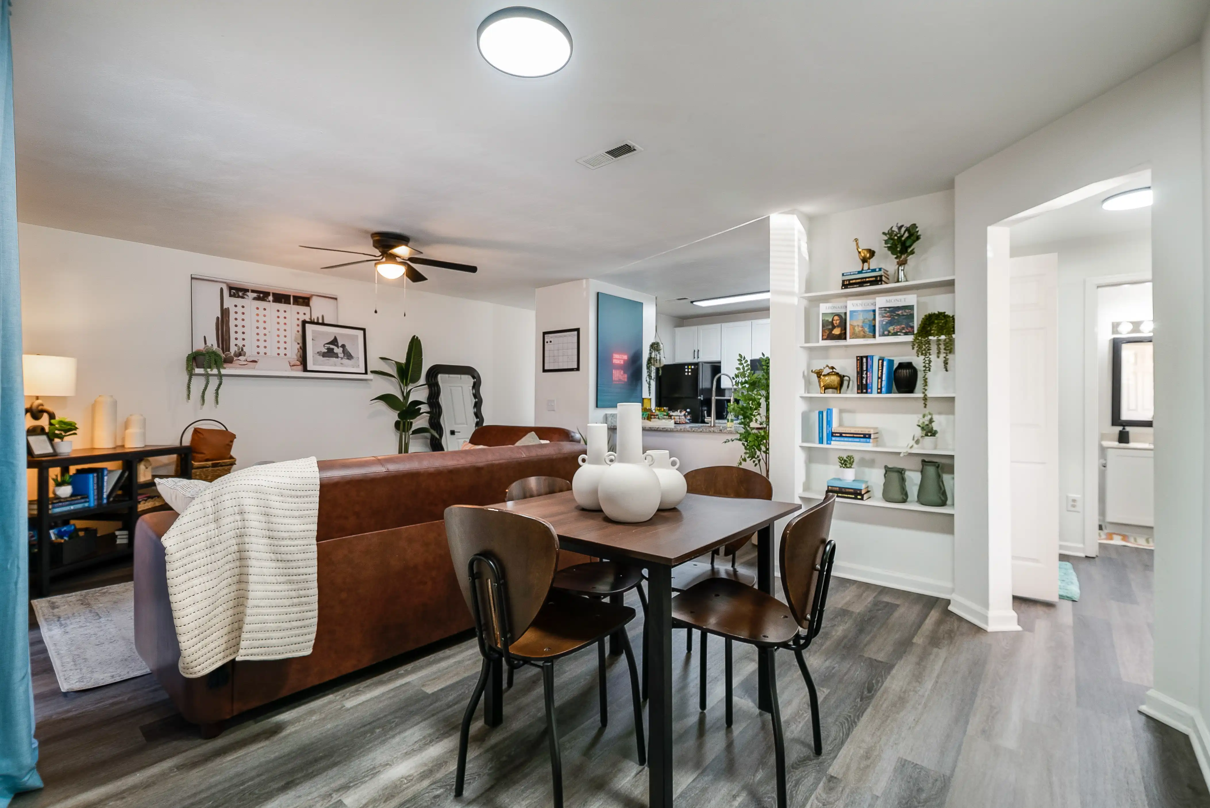 Furnished living and dining area in a Hills Northview apartment