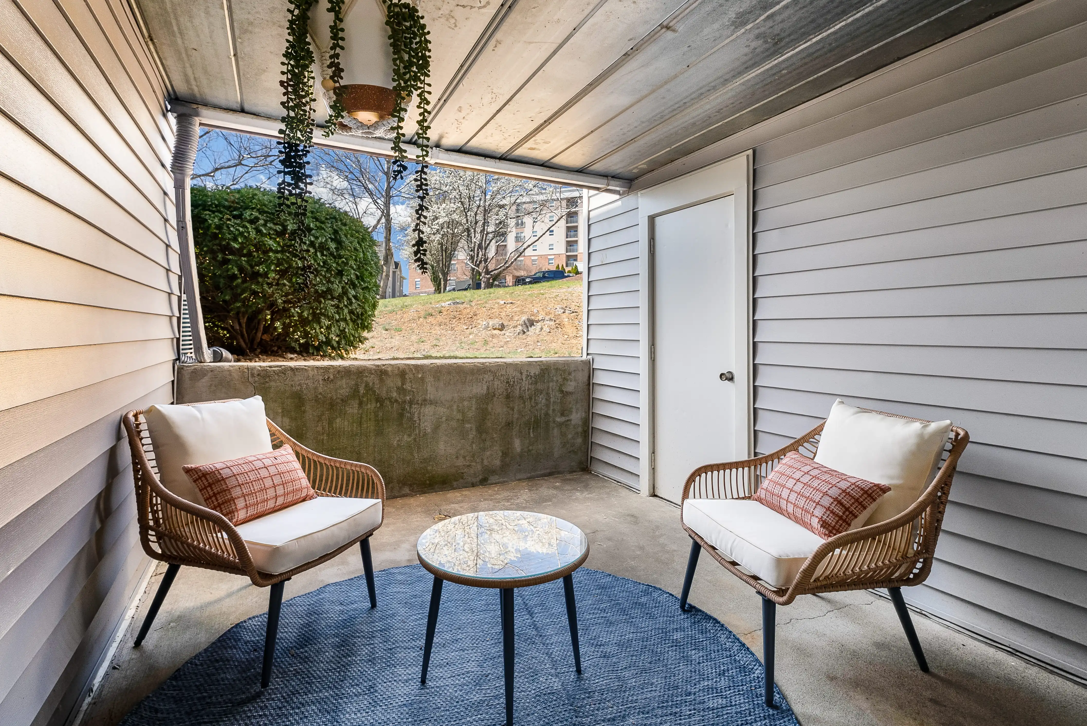 Apartment patio with outdoor seating