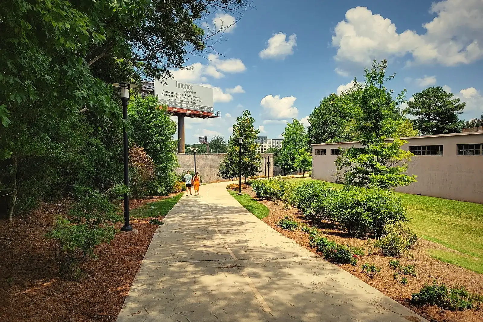The Chamblee Rail Trail, a paved path lined with trees in DeKalb County