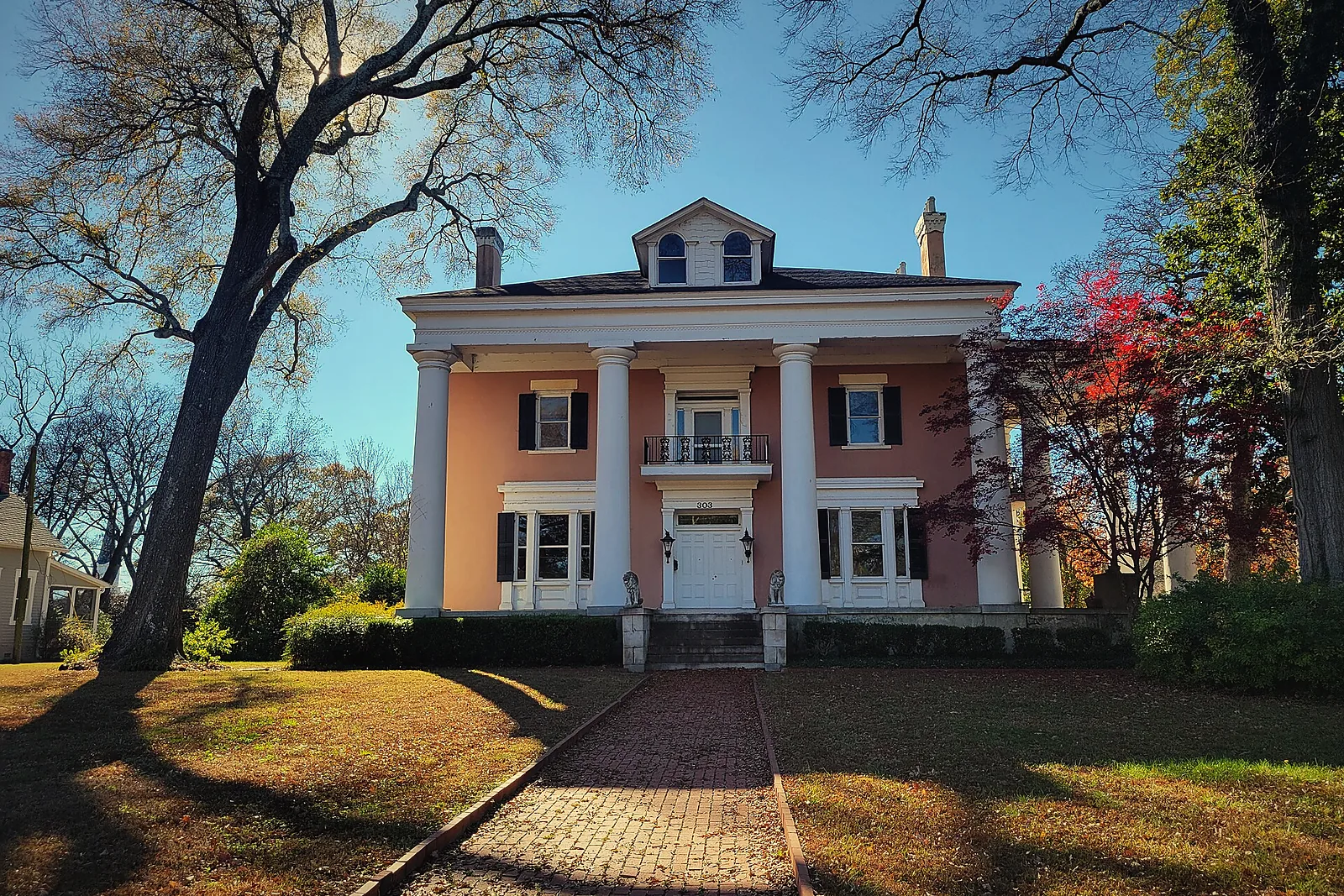 A historic two-story home with a front porch in Marietta