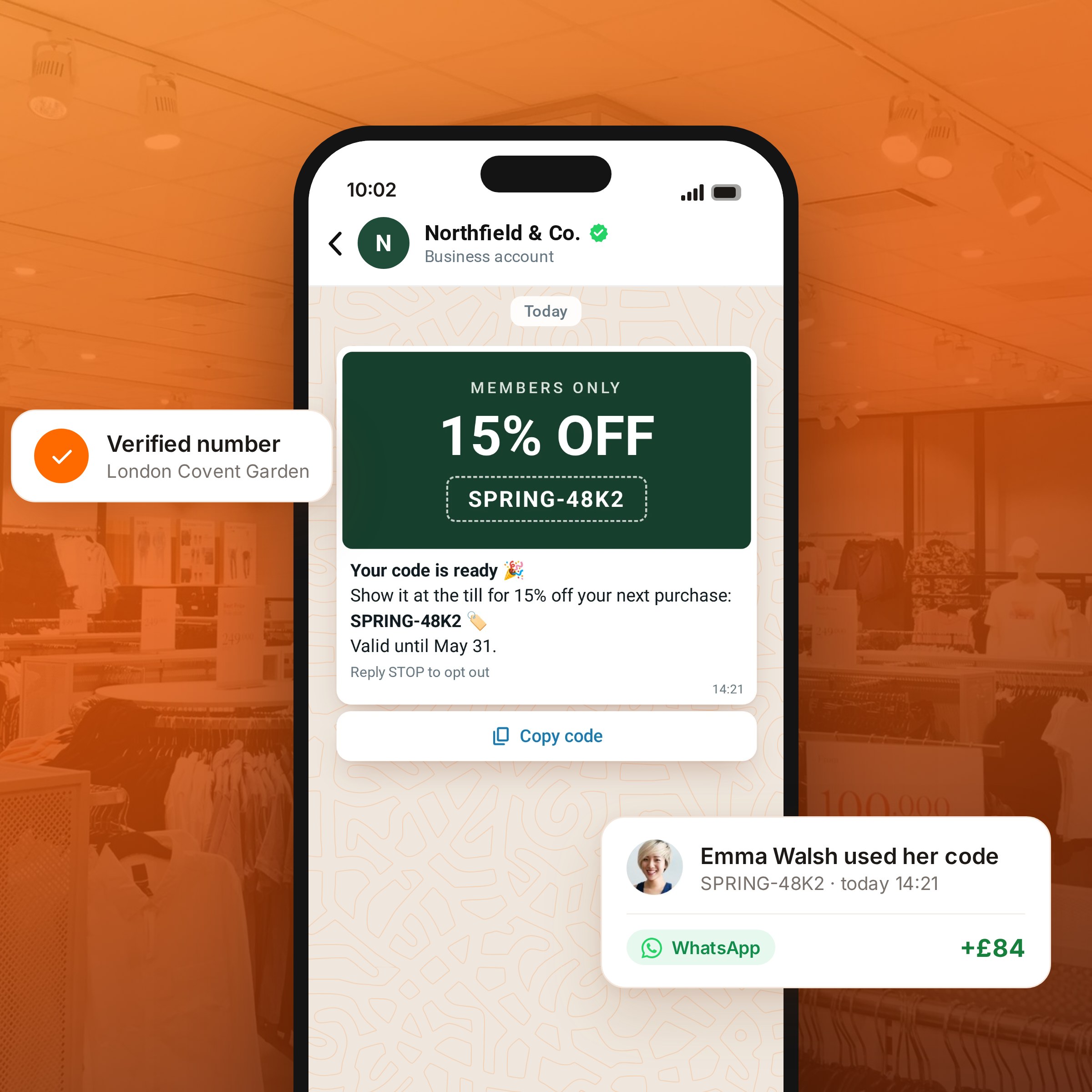 Phone showing a store discount code sent on WhatsApp, with a verified sign-up and a redeemed code