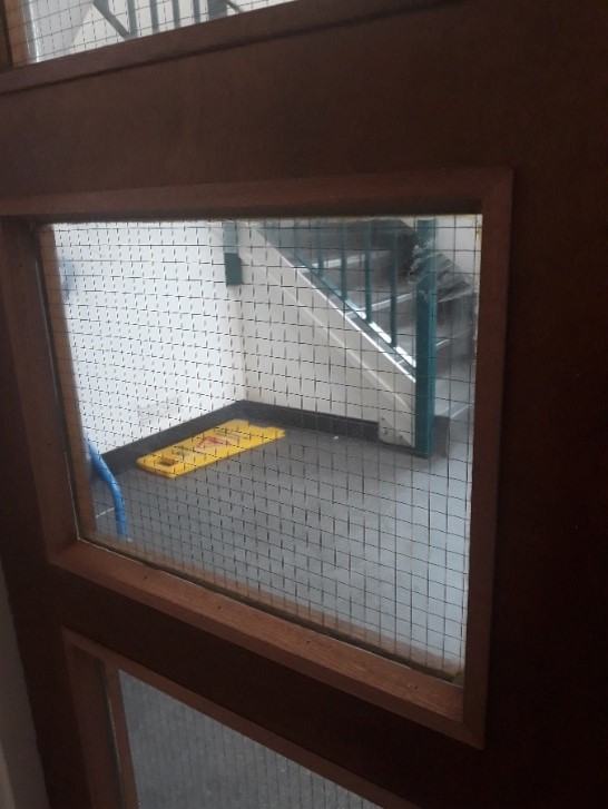 Fire rated vision panel reglazed during remedial works