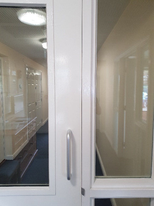 Glazed fire door in a communal corridor