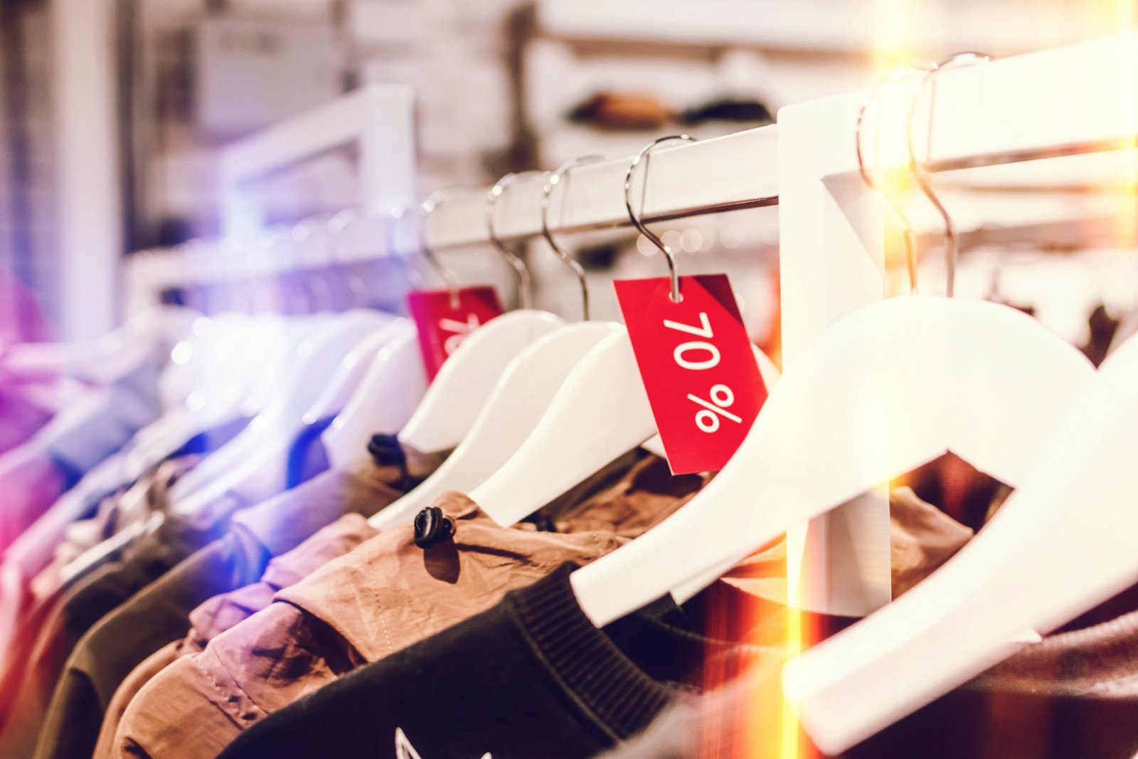Sale tags on a clothing rack