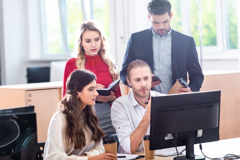Team collaborating on a workplace project