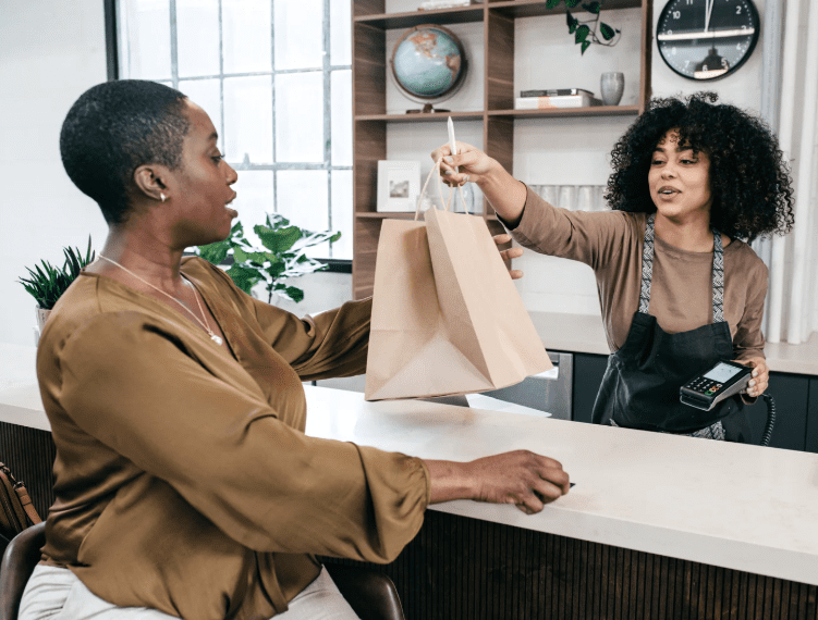 Customer shopping with retail assistant