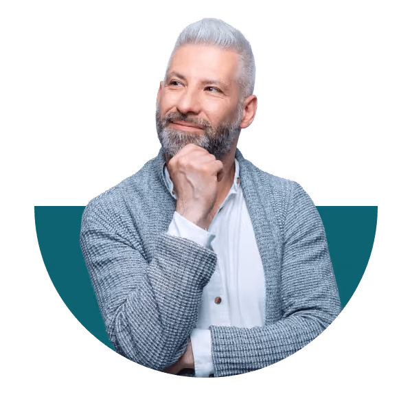 Smiling grey-haired man with hand on chin, looking thoughtful