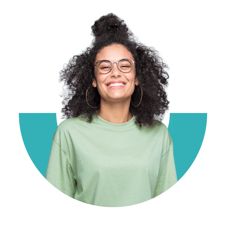 Smiling woman with curly hair and glasses