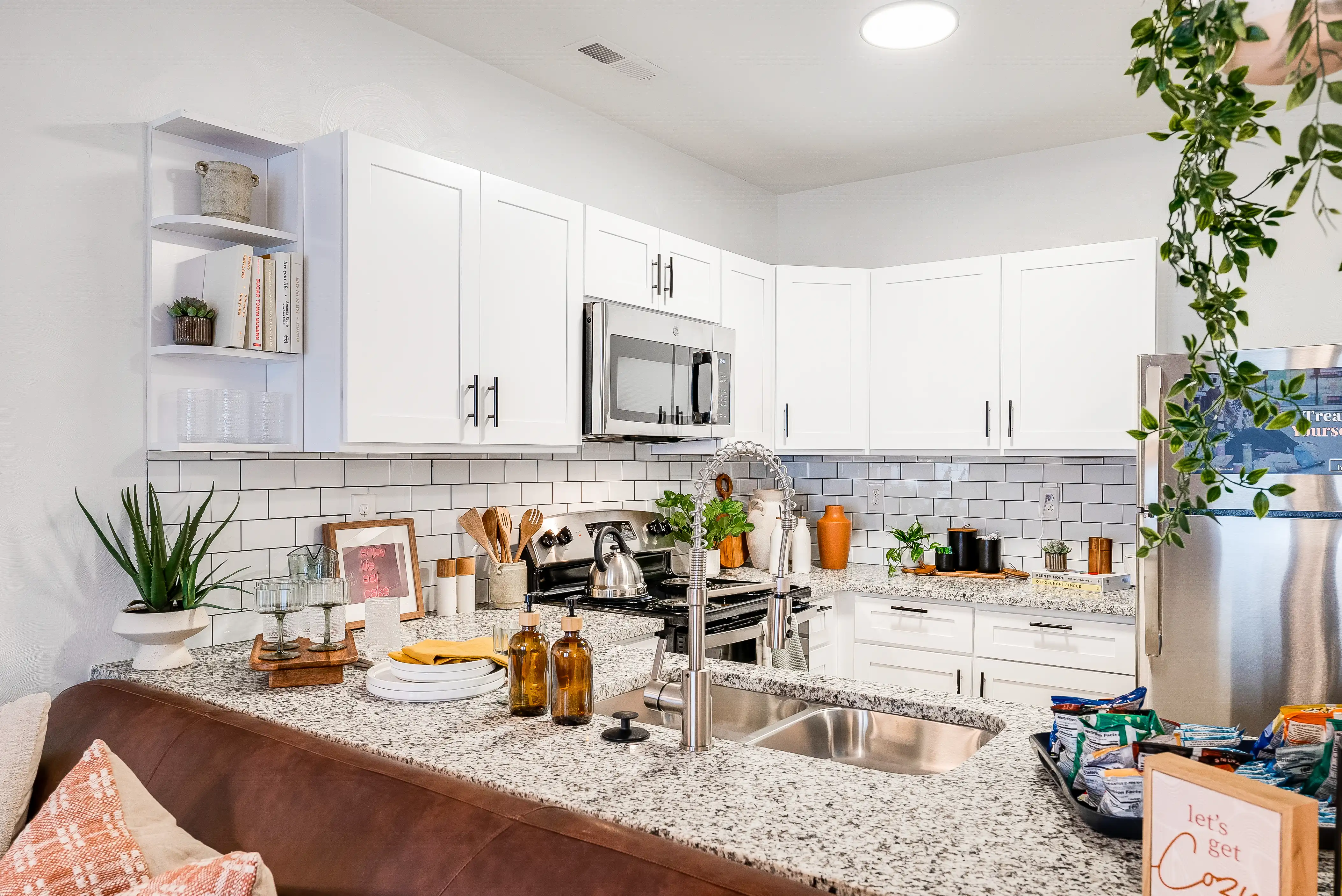 D1 kitchen with microwave and white cabinets at The Hills Southview