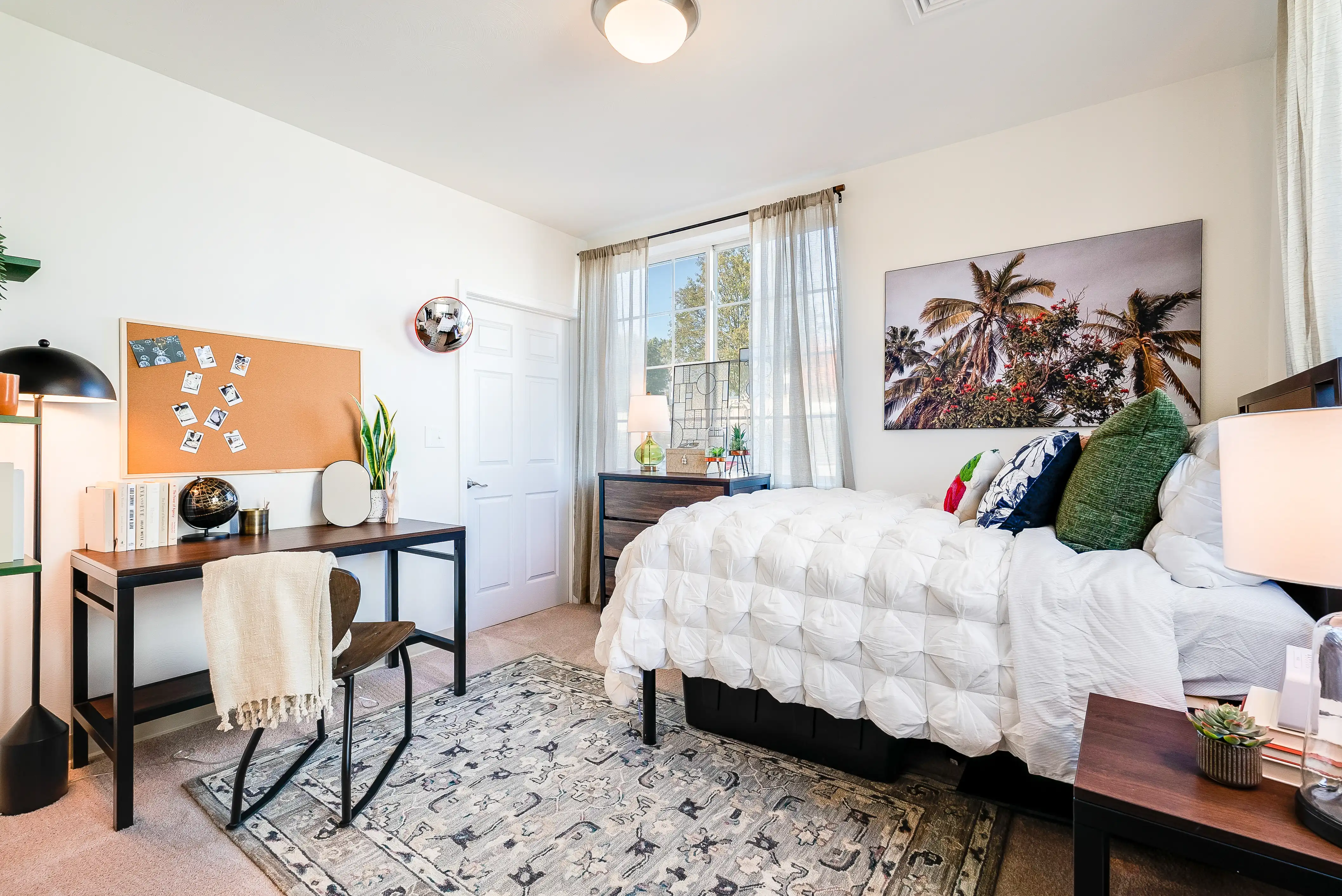 Furnished bedroom with desk and full-size bed at The Hills Southview
