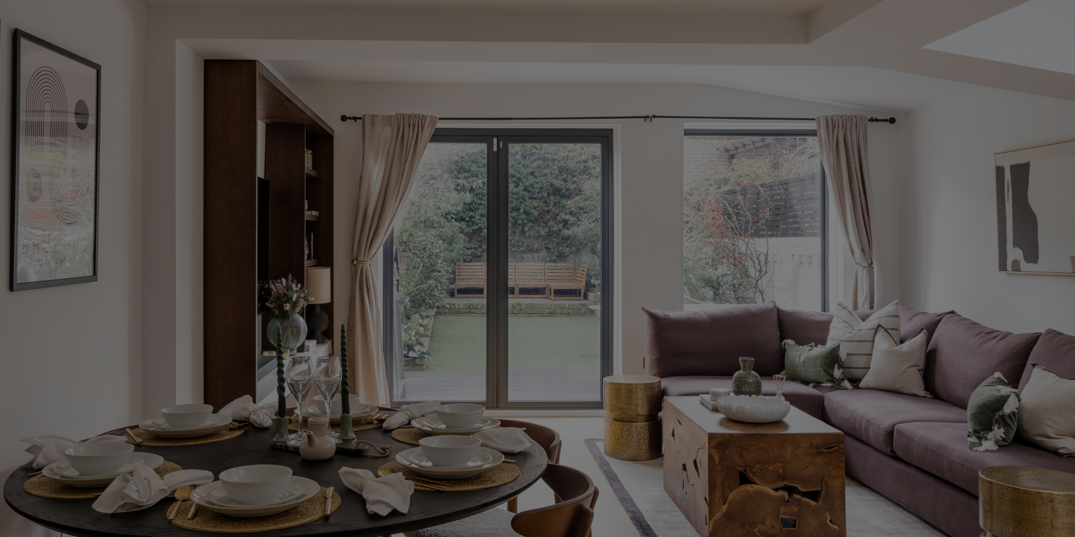 Bright open-plan living and dining room in a furnished short-let home