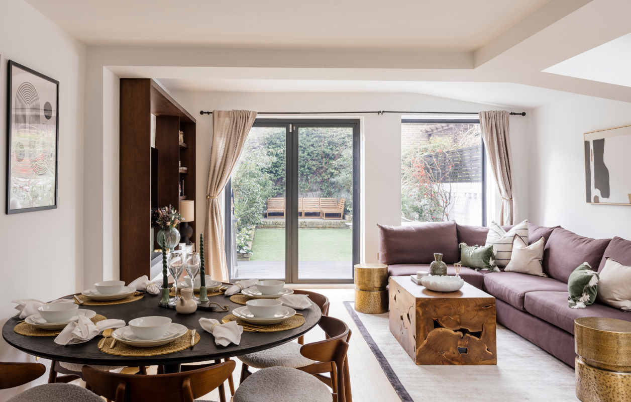 Open-plan living and dining room with garden doors