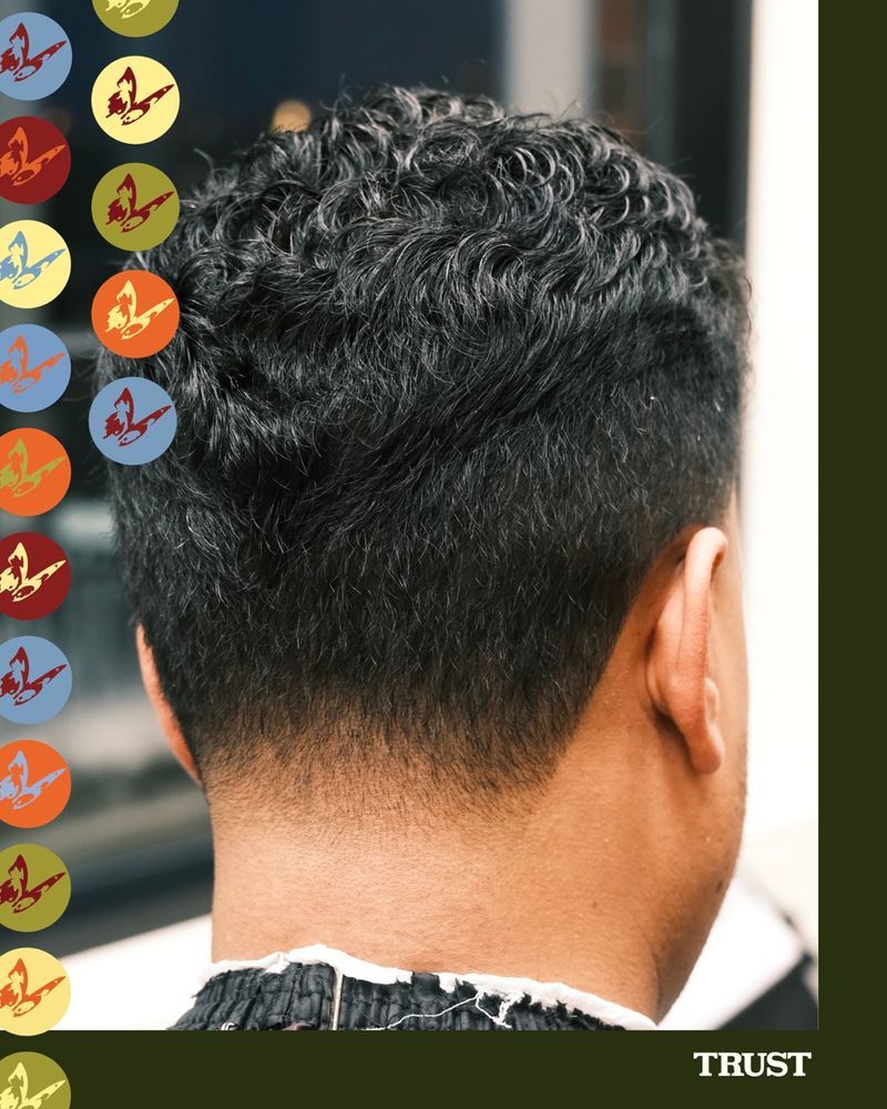 A finished cut from behind, set against a patterned backdrop