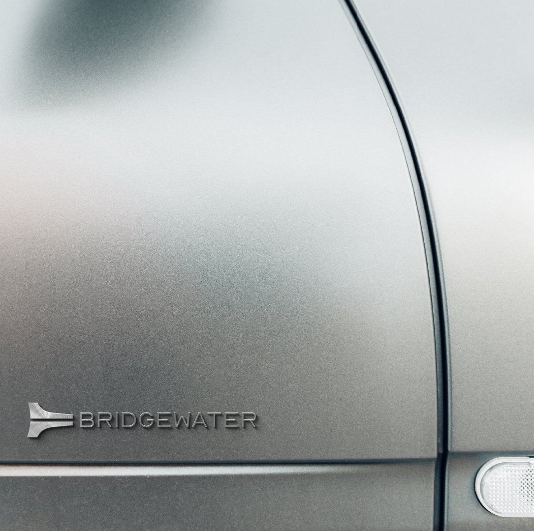 The Bridgewater arrow and wordmark on a brushed silver panel