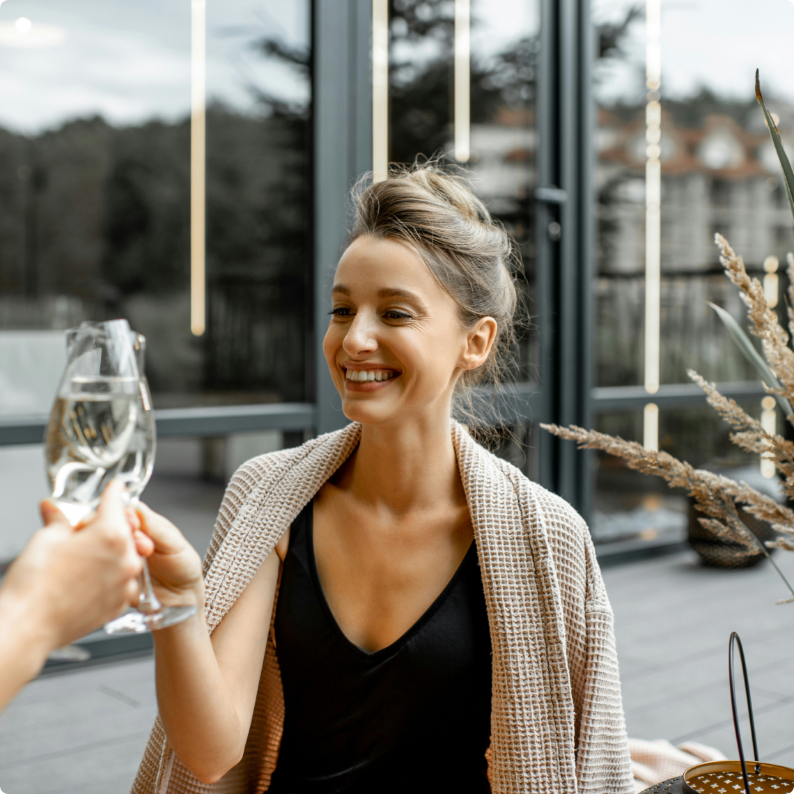 Guest enjoying a glass of sparkling wine