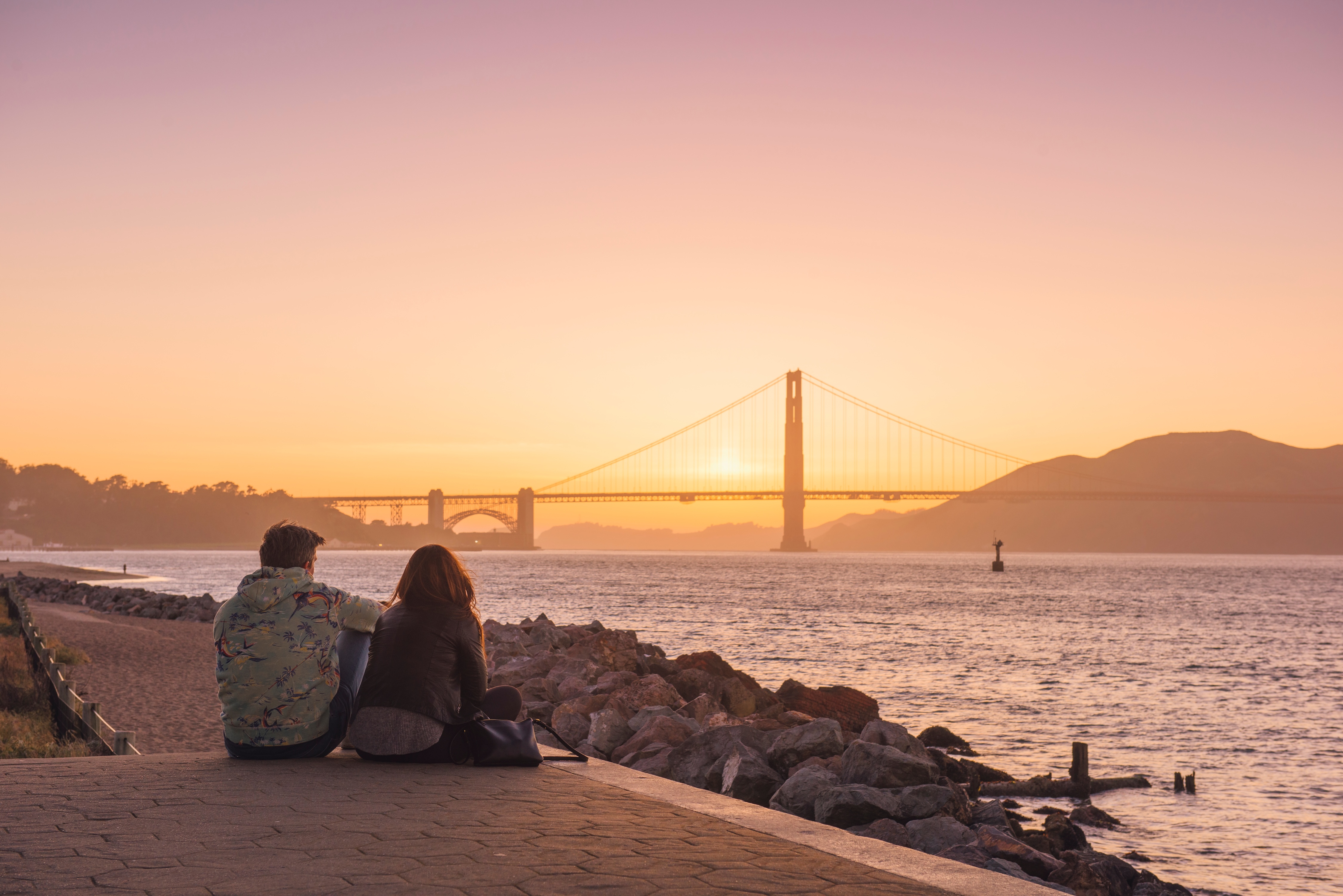 People sitting at the san francisco skyline stock image